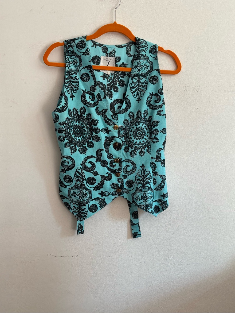 Todd Oldham black and teal paisley print vest with button up front and tie waist
